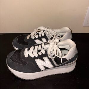 New Balance womens Black and White Low-Top Sneakers